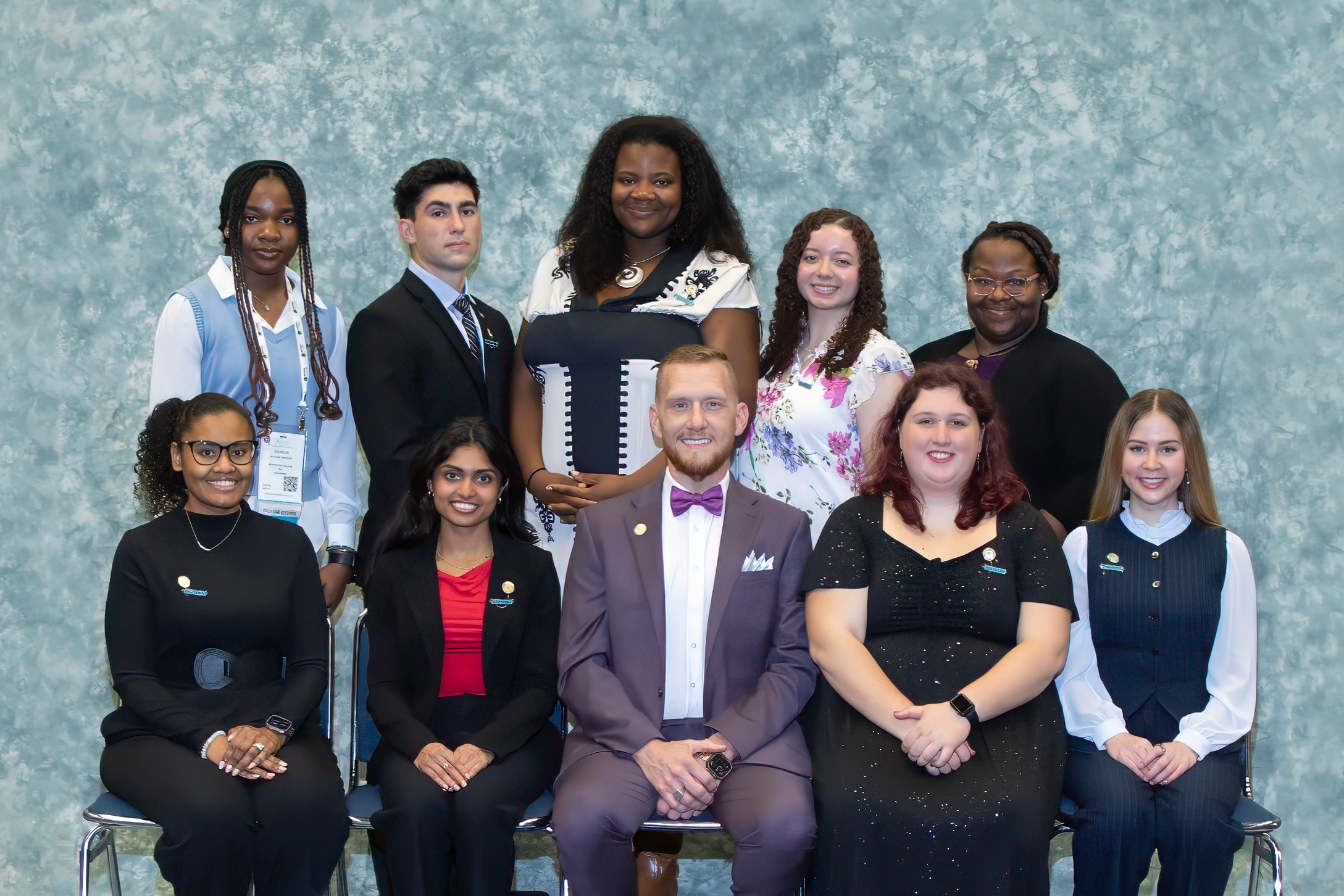 (Pictured: Front row left to right: Shermaine Lambkin, Anna Scaria, Ryan Barrett, Caitrin Lugger, Addisyn Poole; Back left to right: Favour Nwozor, Damian Burac, Clara Eke, Sophia Espaillat, Janai McFarland)